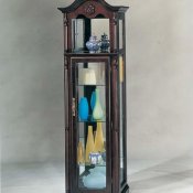Cherry Finish Curio With Arched Top