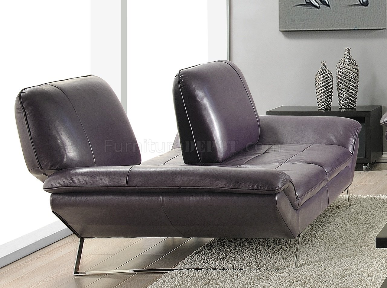 eggplant colored leather sofa