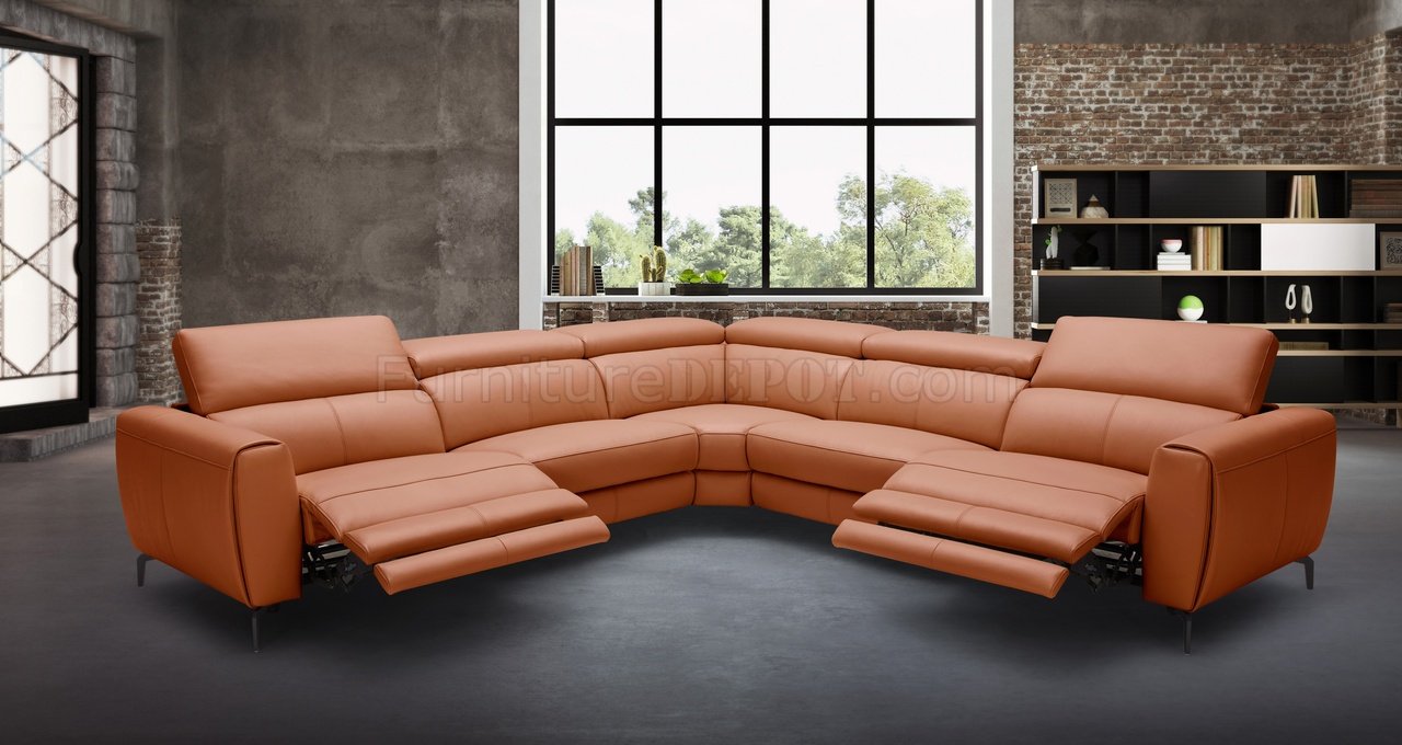 curved rust colored leather sofa
